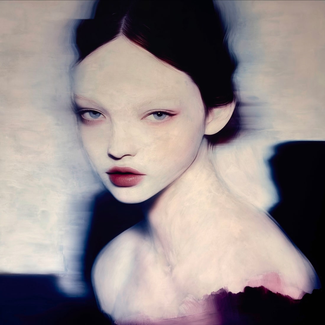 “MEETH 02” by Giuseppe Scarangelli, mixed media on aluminium panel, 150×150 cm, 2025. A large-scale contemporary portrait depicting a young woman with an ethereal, almost translucent complexion. Her features are softly rendered with delicate shading, while blurred contours around her hair and shoulders create a sense of motion and dreamlike atmosphere. The composition uses cool blue, violet, and muted grey tones, contrasted by dark details framing the face. The work blends realism with abstraction, giving the figure a haunting, otherworldly presence.